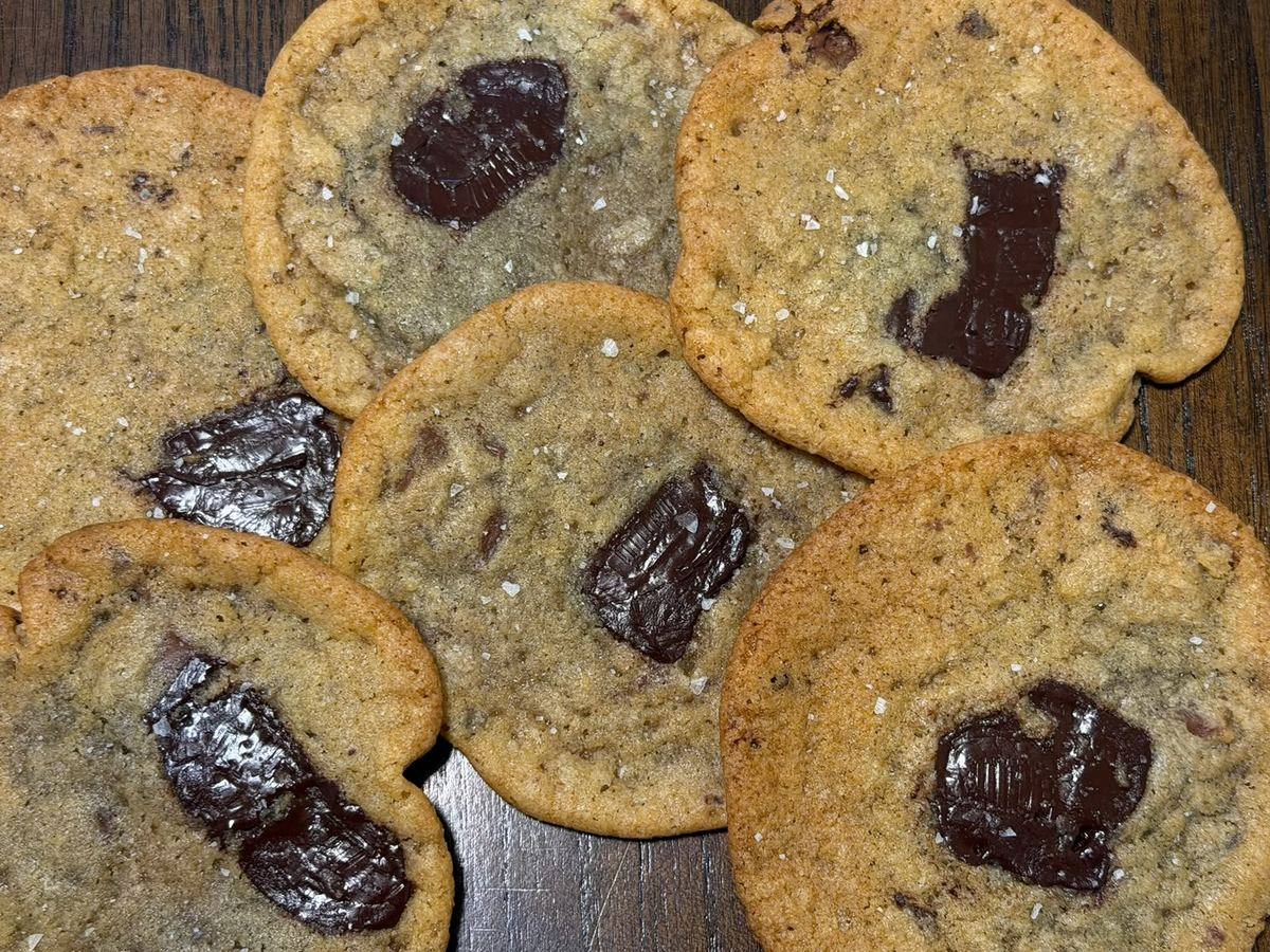 Milk and dark chocolate sea salt cookies with large chocolate pieces and salt flakes